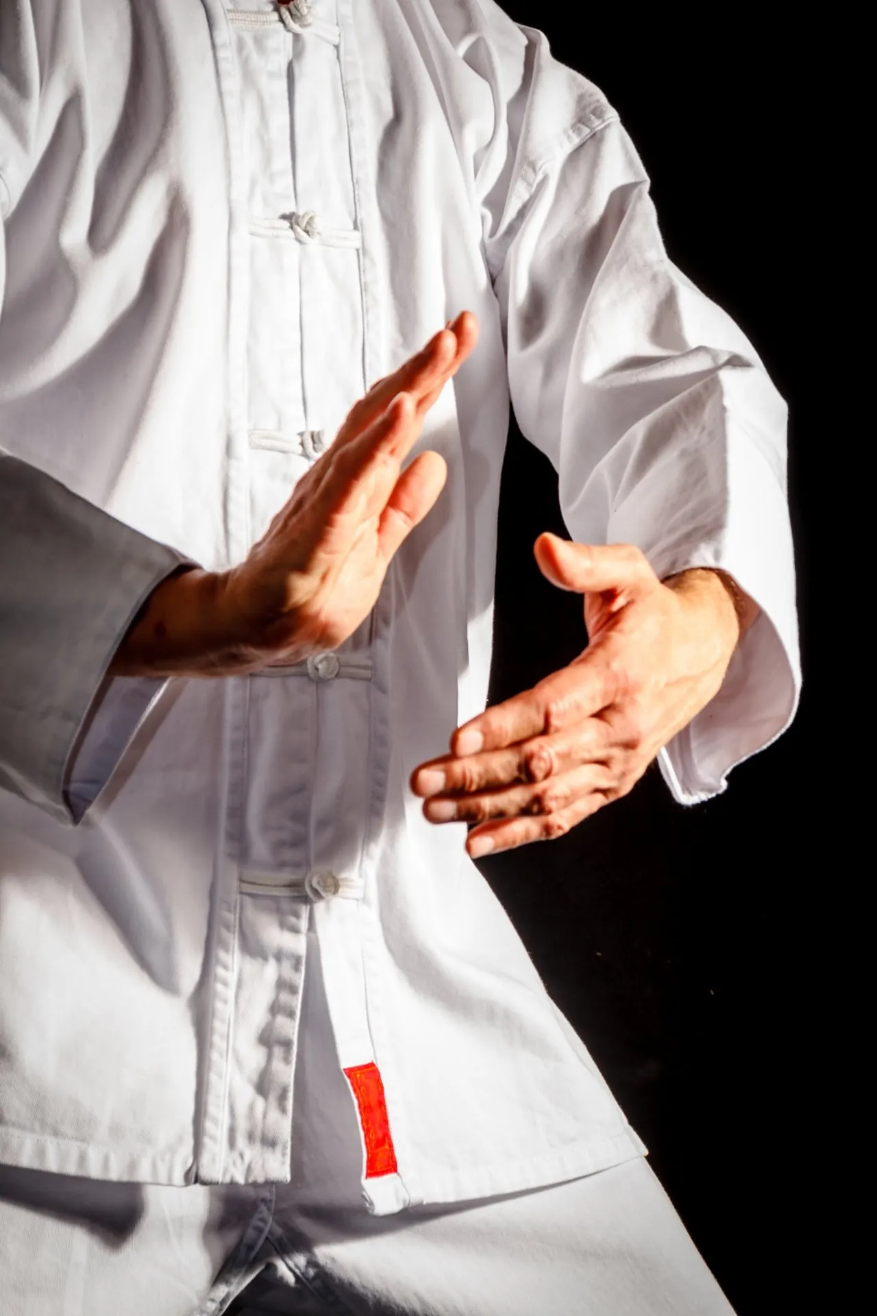 Hands held in a Taichi posture